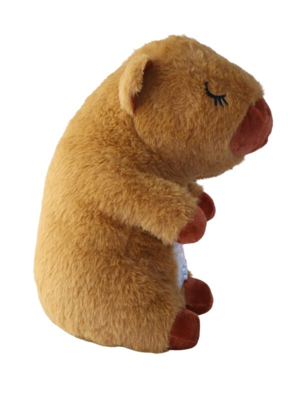 Peluche Capibara Soñadora con Proyector de estrellas y Música.