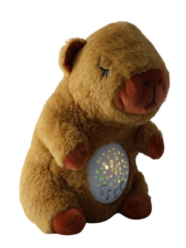 Peluche Capibara Soñadora con Proyector de estrellas y Música.